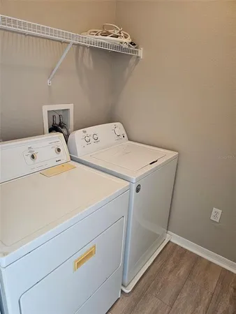 a utility room with dryer and washer