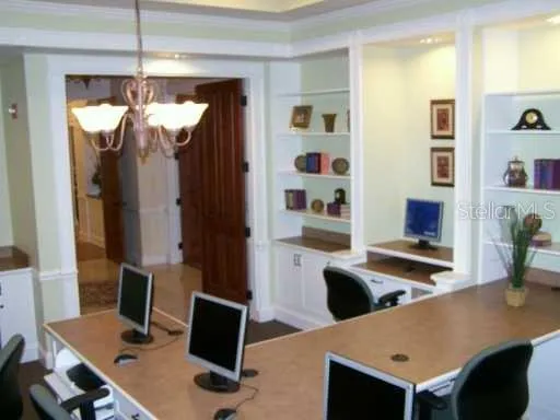 a gym room with lots of gym equipment