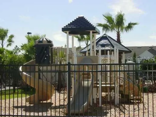 a room with furniture and a flat screen tv