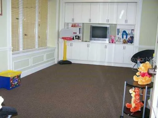 a view of a building with a swimming pool