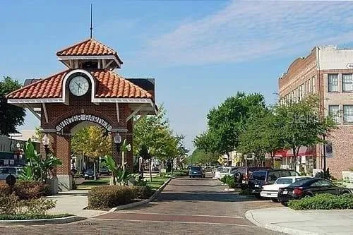 a view of a house with palm tree