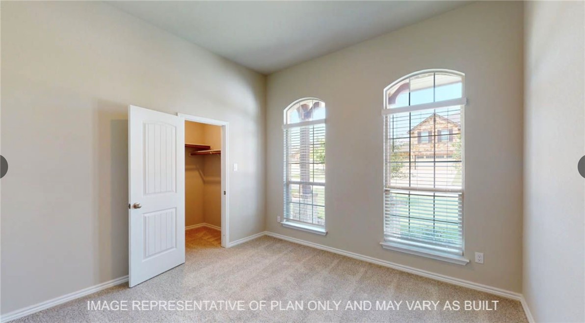 9805 Bridlewood Lane Waco, TX 76708 - Photo 16 of 35 an empty room with windows