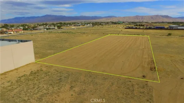 a view of an ocean and a mountain