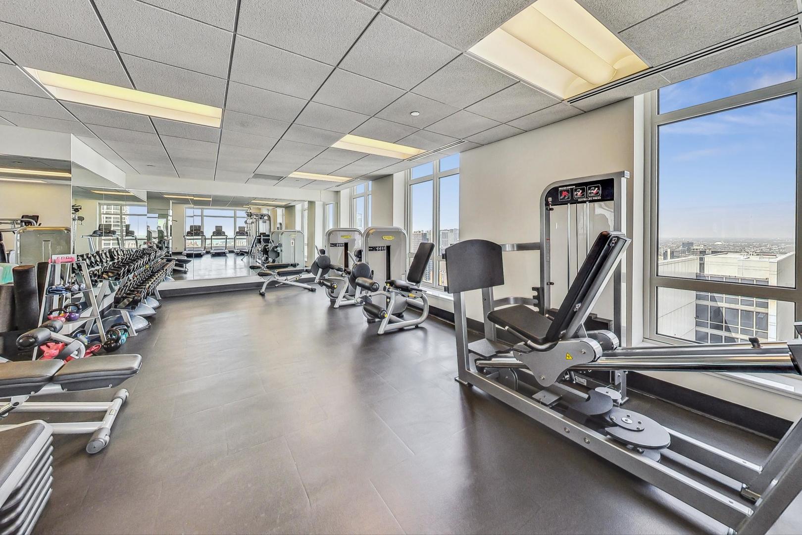 10 East Delaware Place, Unit 20A Chicago, IL 60611 - Photo 27 of 41 a view of a room with gym equipment