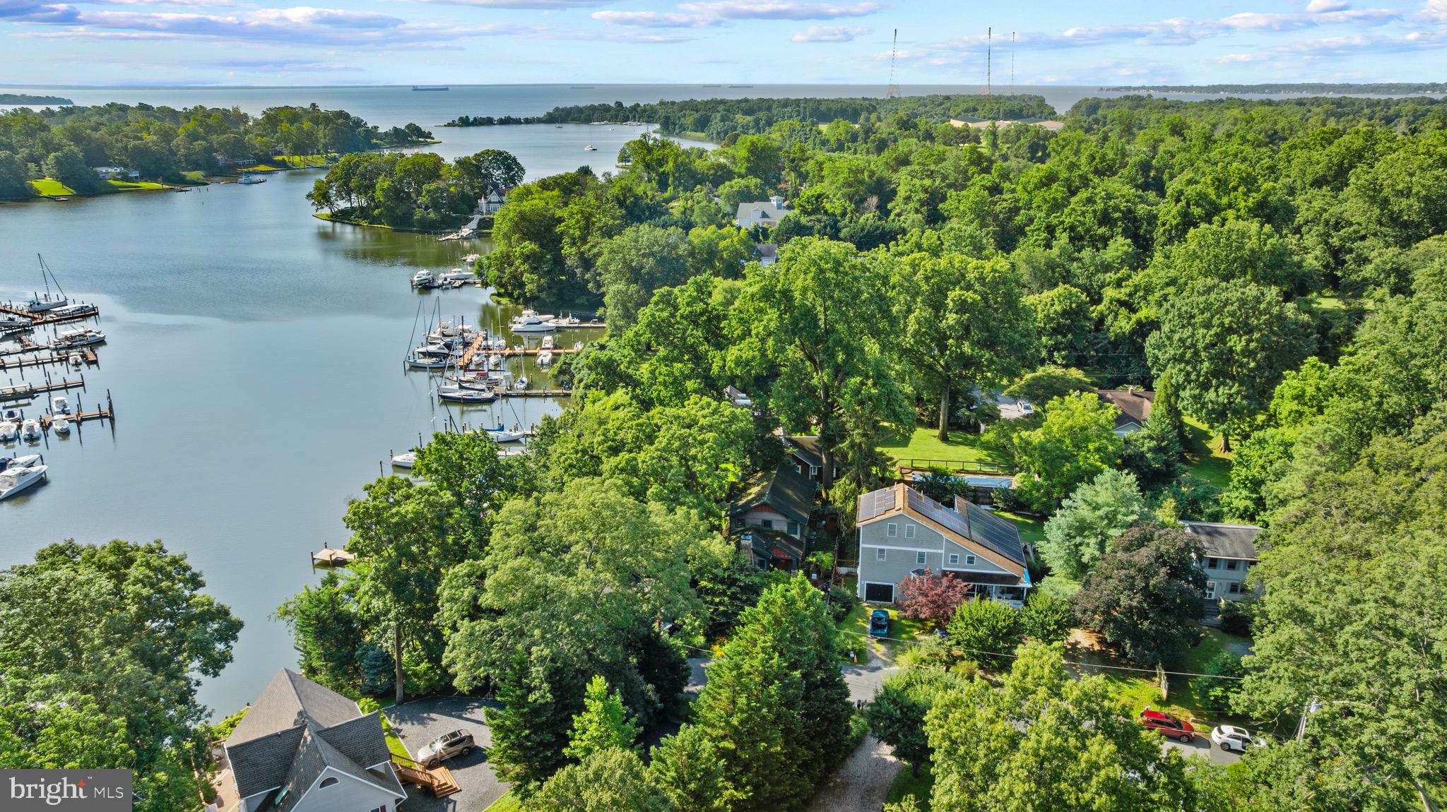 2233 Mulberry Hill Road Annapolis, MD 21409 - Photo 1 of 5 an aerial view of a house with a yard and lake view