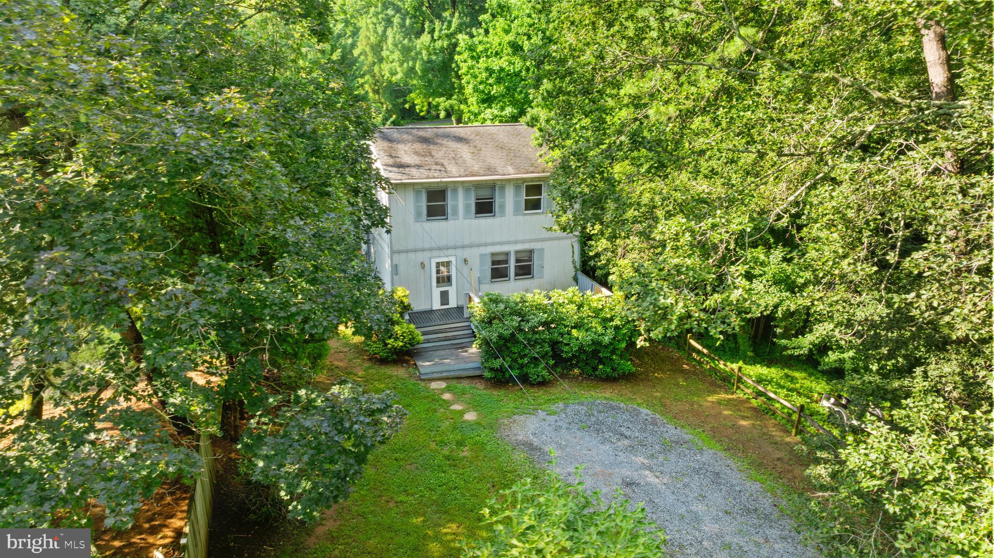 2233 Mulberry Hill Road Annapolis, MD 21409 - Photo 2 of 5 a view of a house with a yard