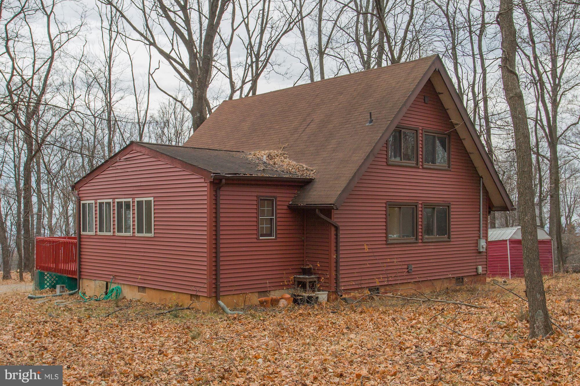 103 Club House Road Front Royal, VA 22630 - Photo 20 of 30 a view of a house with a yard