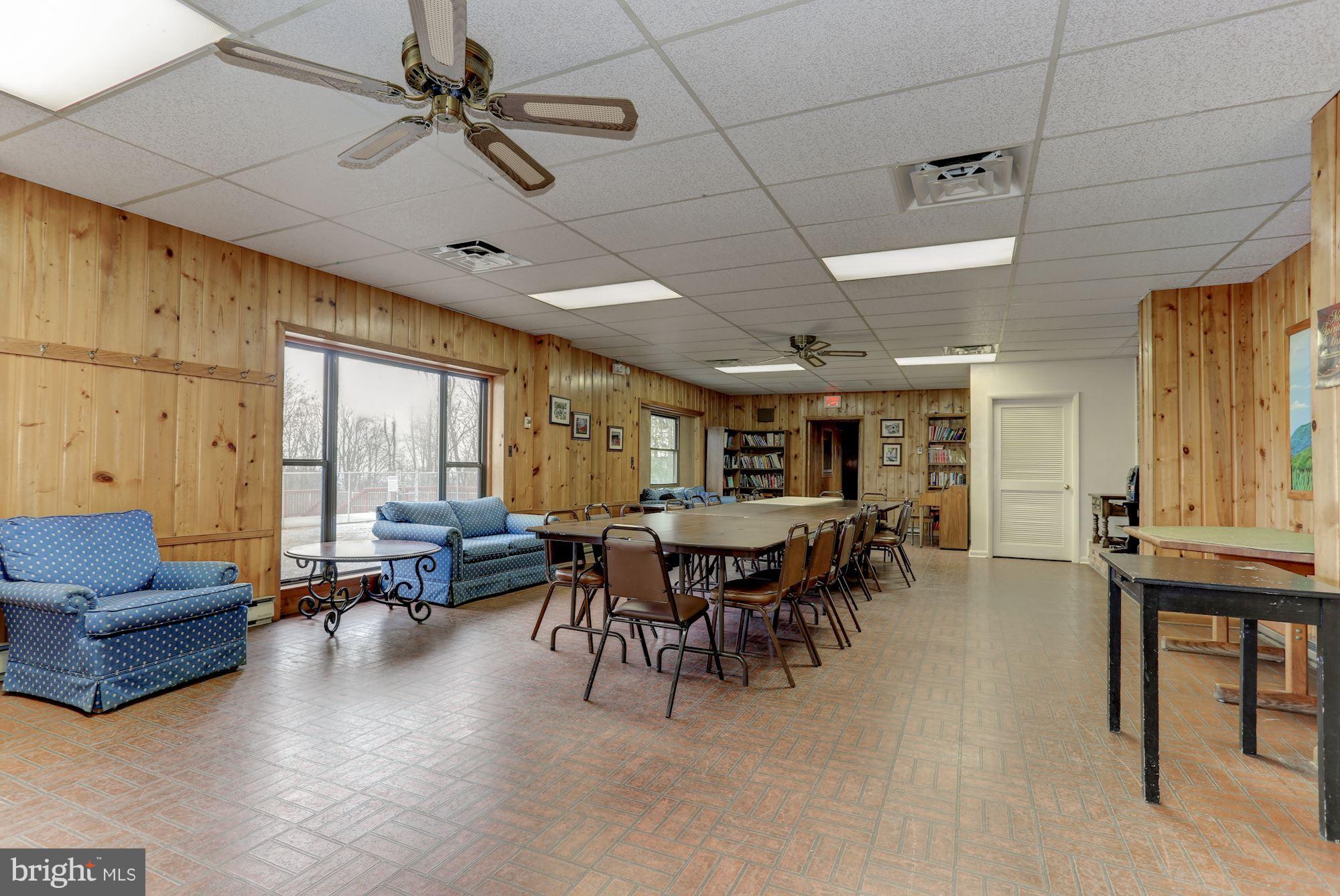 103 Club House Road Front Royal, VA 22630 - Photo 24 of 30 a dining room with furniture window and outdoor view