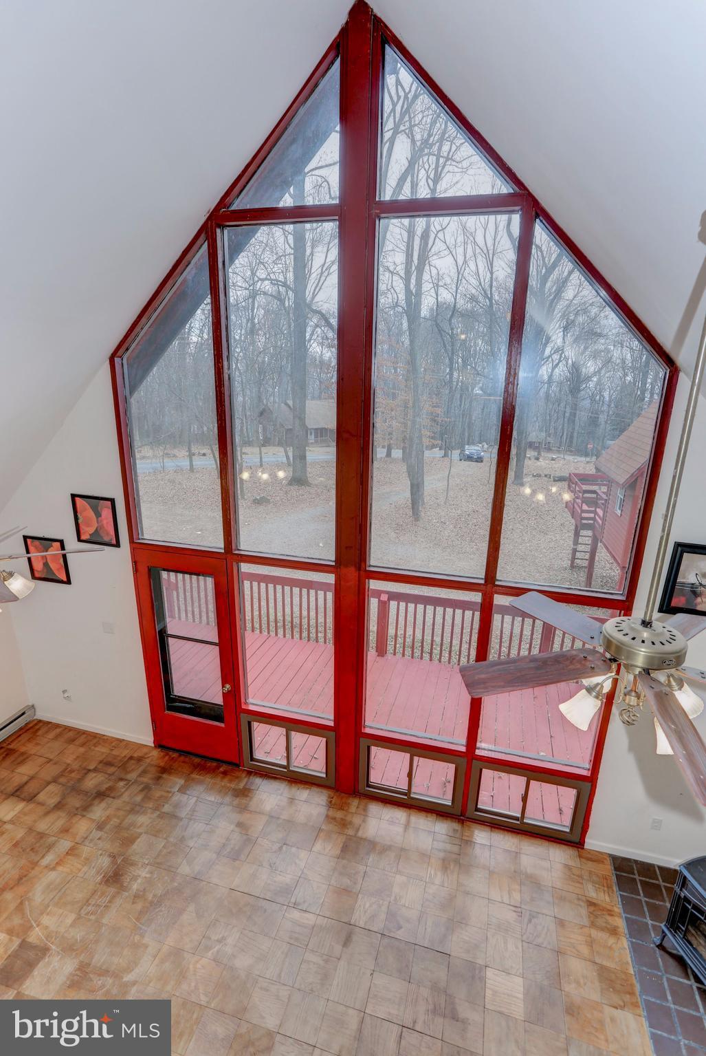 103 Club House Road Front Royal, VA 22630 - Photo 7 of 30 a view of an empty room with windows