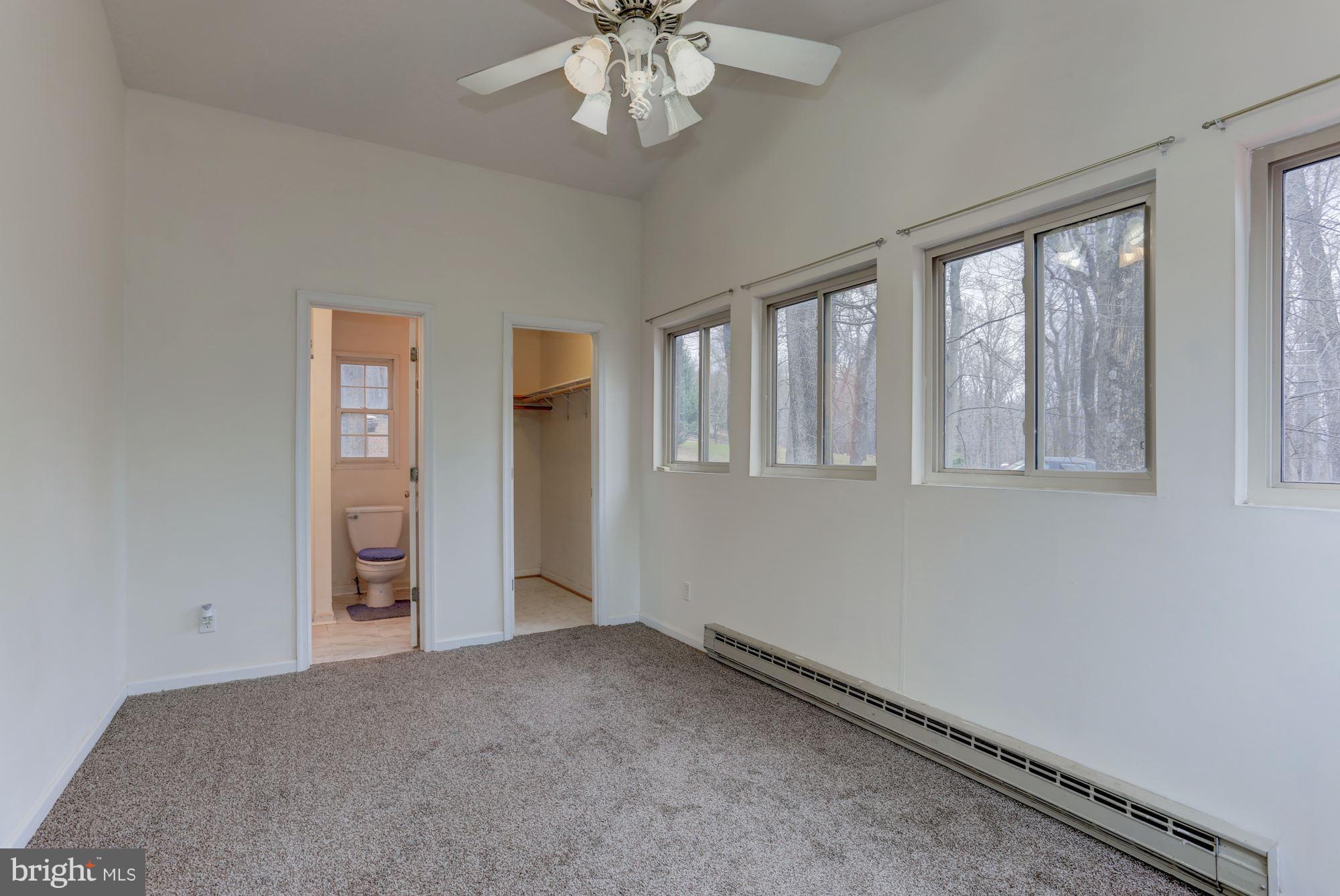 103 Club House Road Front Royal, VA 22630 - Photo 9 of 30 a view of an empty room with a window