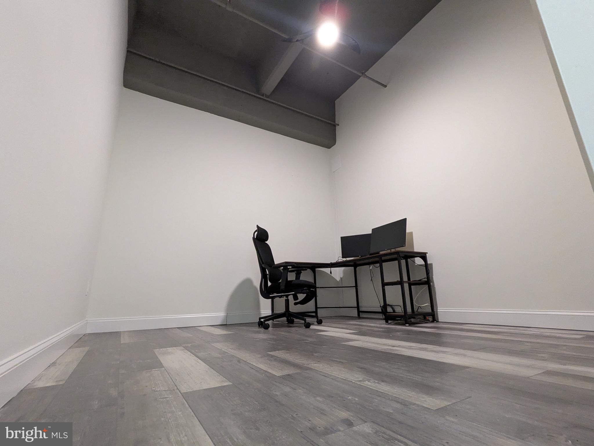 511 North Broad Street, Unit 204 Philadelphia, PA 19123 - Photo 17 of 47 a workspace with furniture and a window