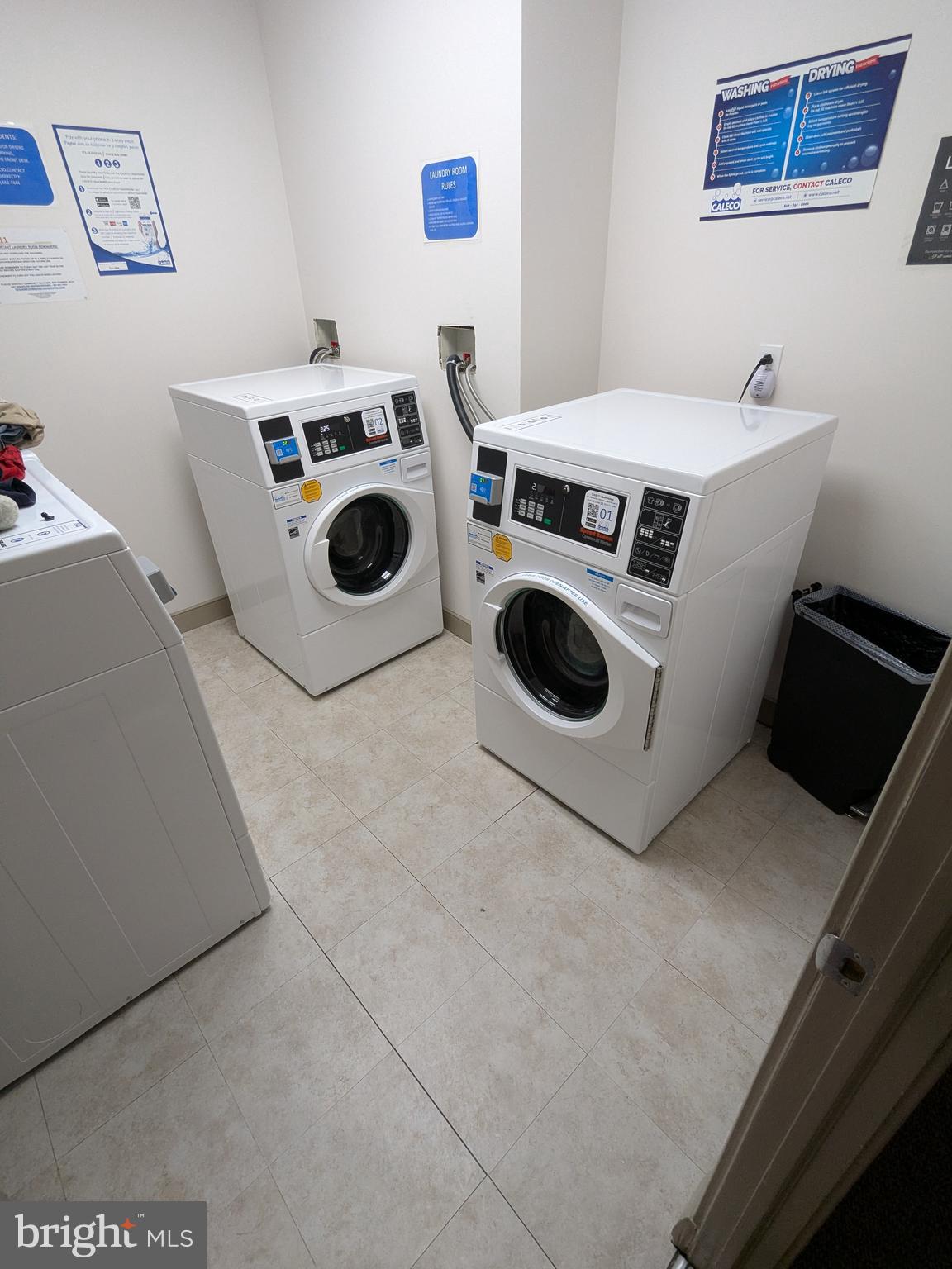 511 North Broad Street, Unit 204 Philadelphia, PA 19123 - Photo 19 of 47 a utility room with dryer and washer