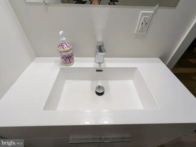 a bathroom with a shower and a bathtub