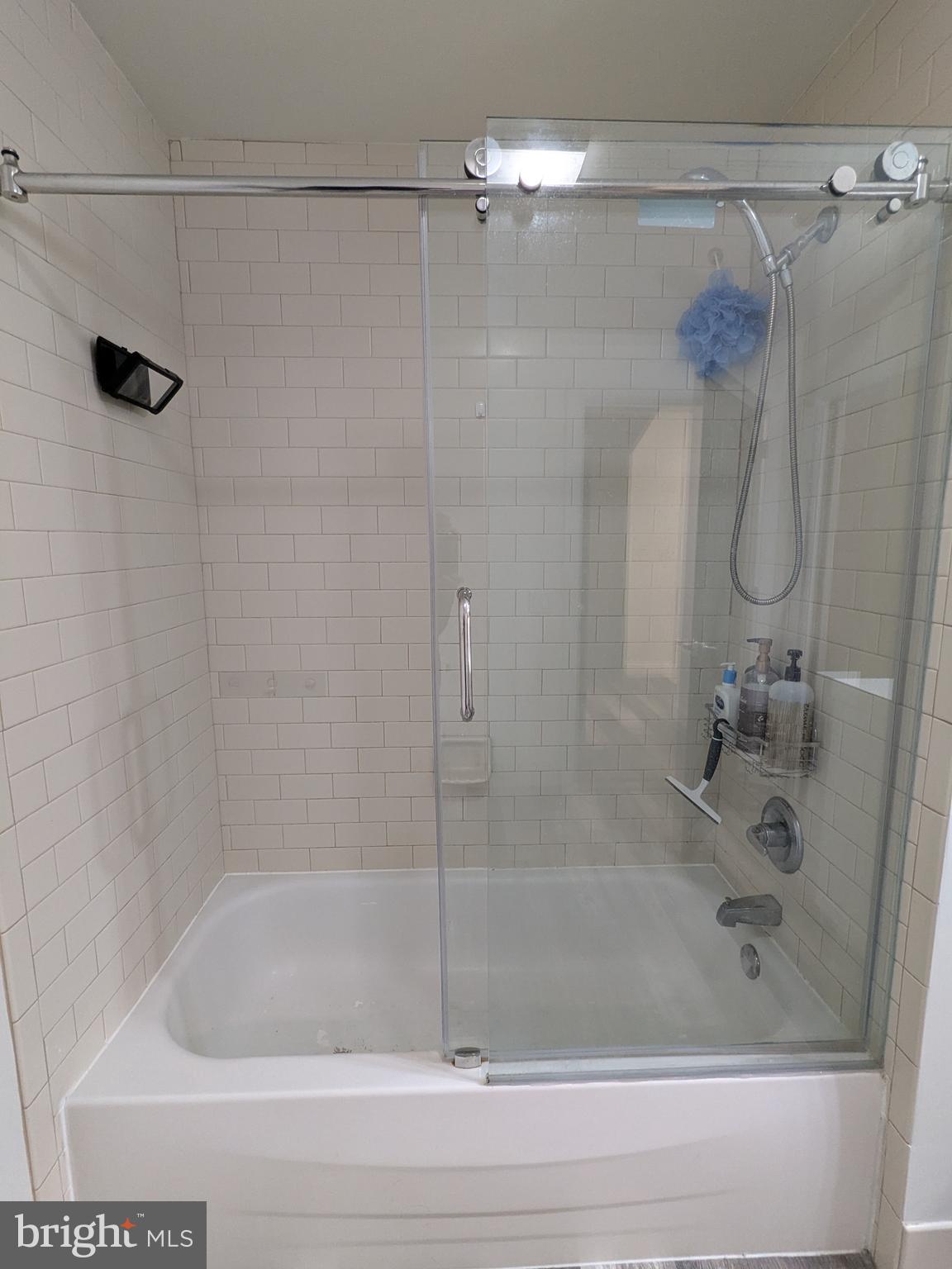 511 North Broad Street, Unit 204 Philadelphia, PA 19123 - Photo 25 of 47 a bathroom with a shower and a bathtub