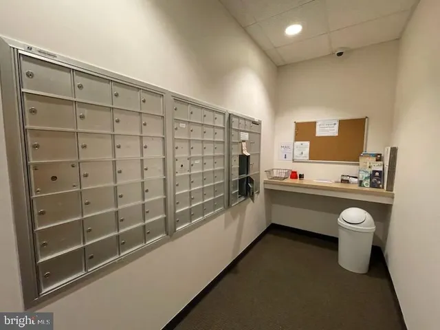 a sitting area with wooden floor