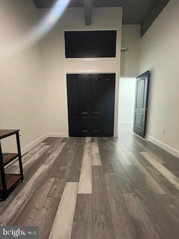 511 North Broad Street, Unit 204 Philadelphia, PA 19123 - Photo 38 of 47 a view of a hallway with wooden floor and a fireplace