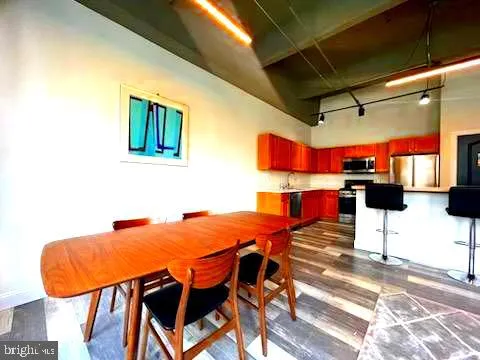 a view of a patio with a table and chairs