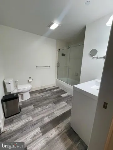 a bathroom with a shower and a bathtub