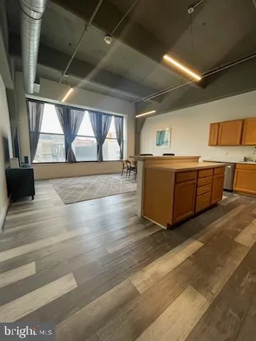 a stove top oven sitting inside of a kitchen