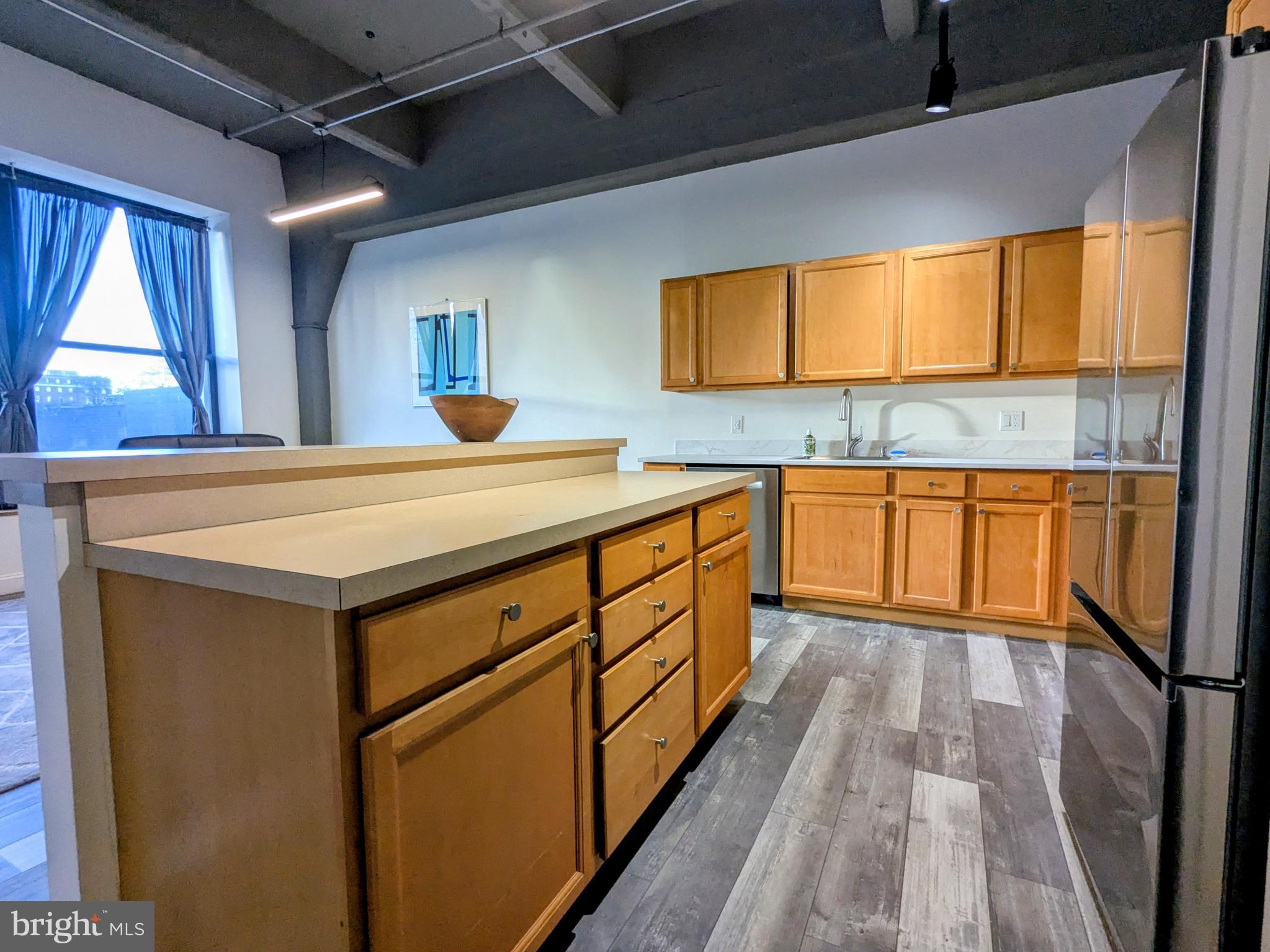 511 North Broad Street, Unit 204 Philadelphia, PA 19123 - Photo 8 of 47 a kitchen with a sink and cabinets