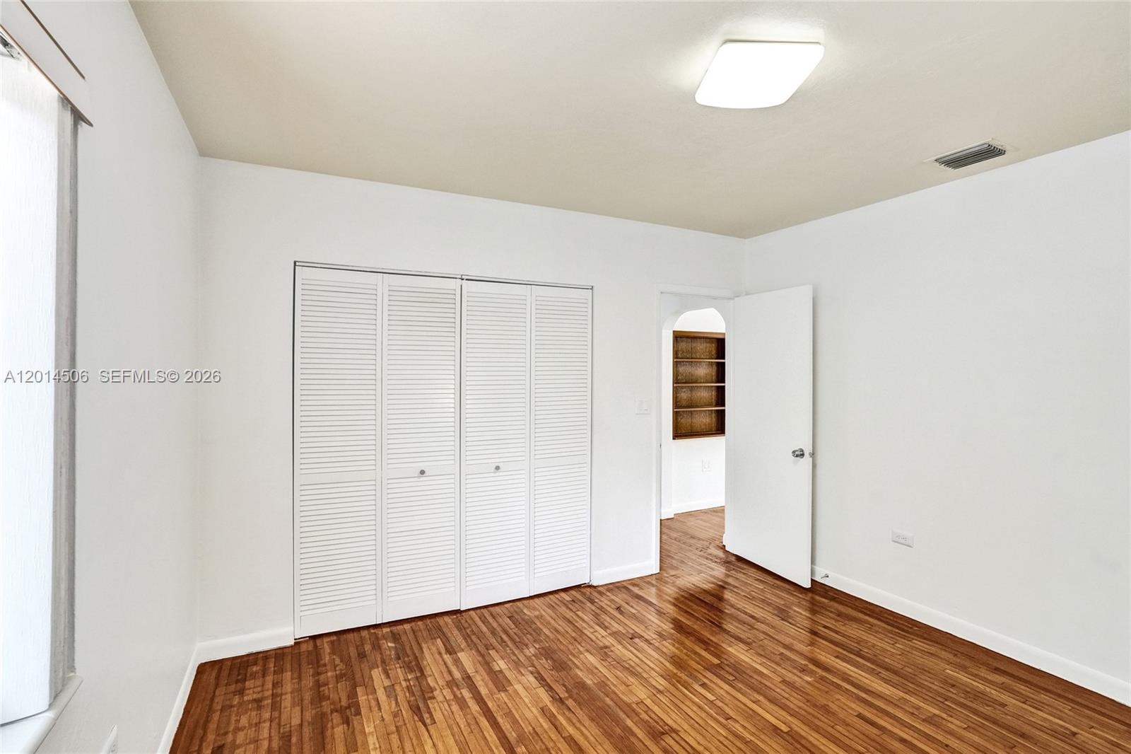 2420 Southwest 16th Street Miami, FL 33145 - Photo 18 of 35 wooden floor in an empty room
