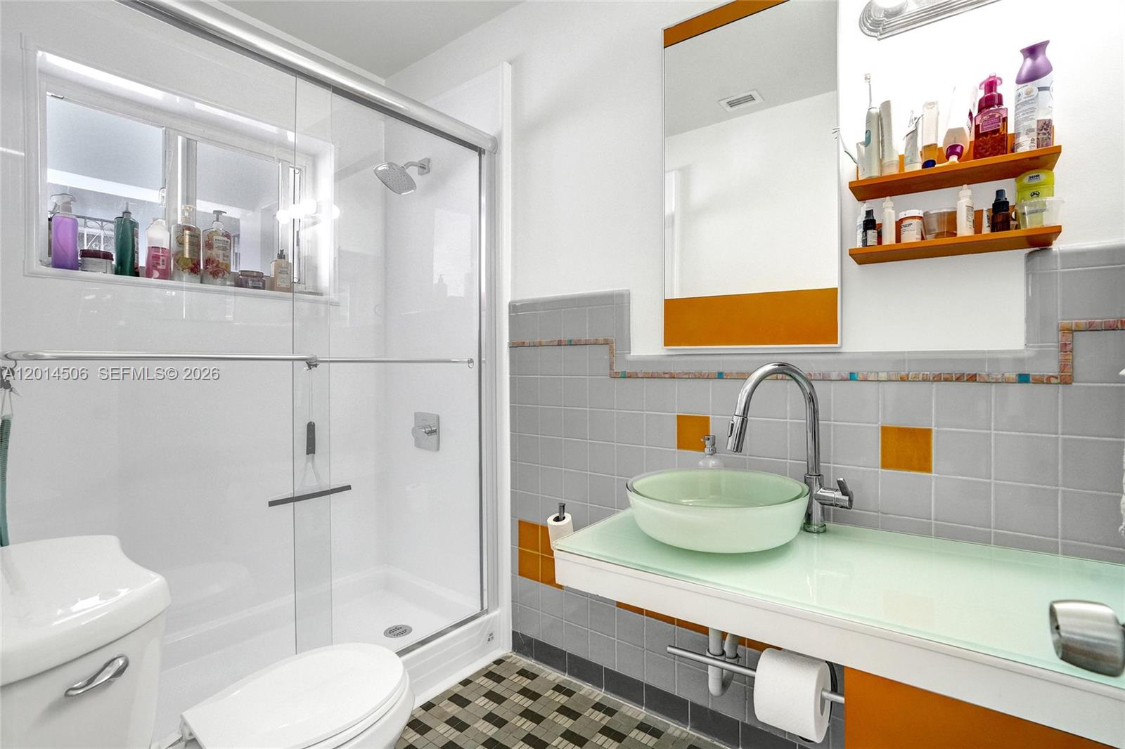 2420 Southwest 16th Street Miami, FL 33145 - Photo 21 of 35 a bathroom with a sink a toilet and shower
