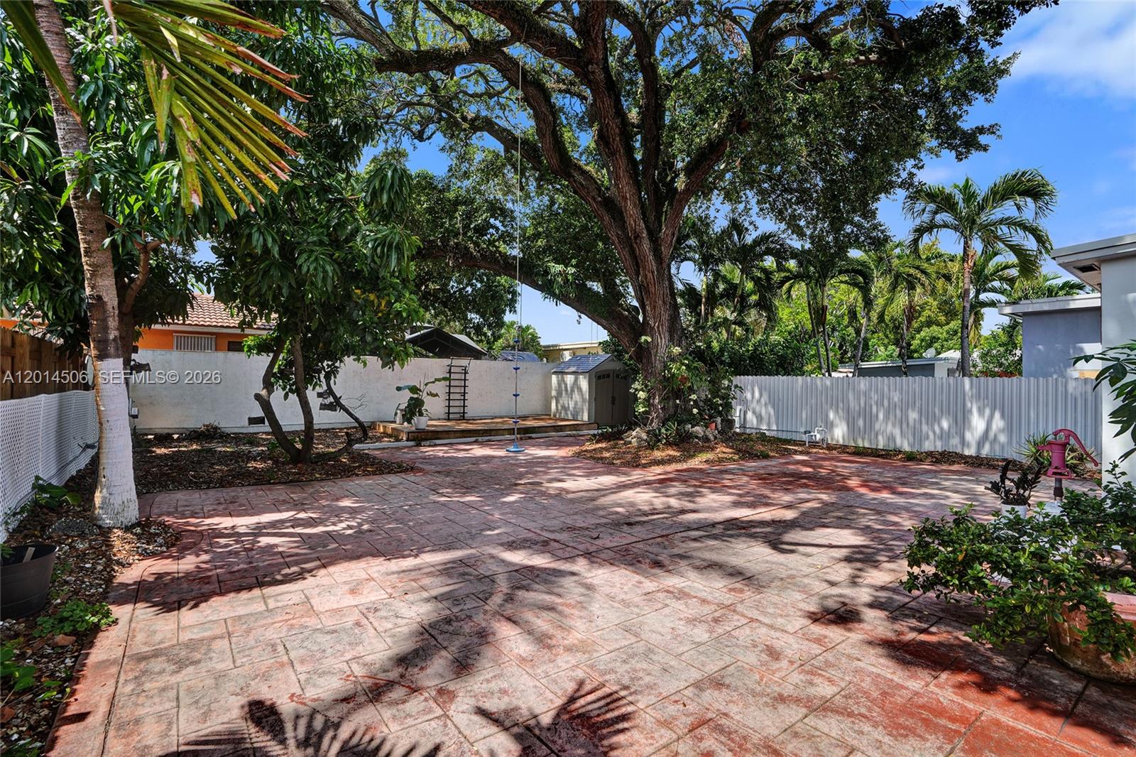 2420 Southwest 16th Street Miami, FL 33145 - Photo 29 of 35 a view of a backyard with a tree