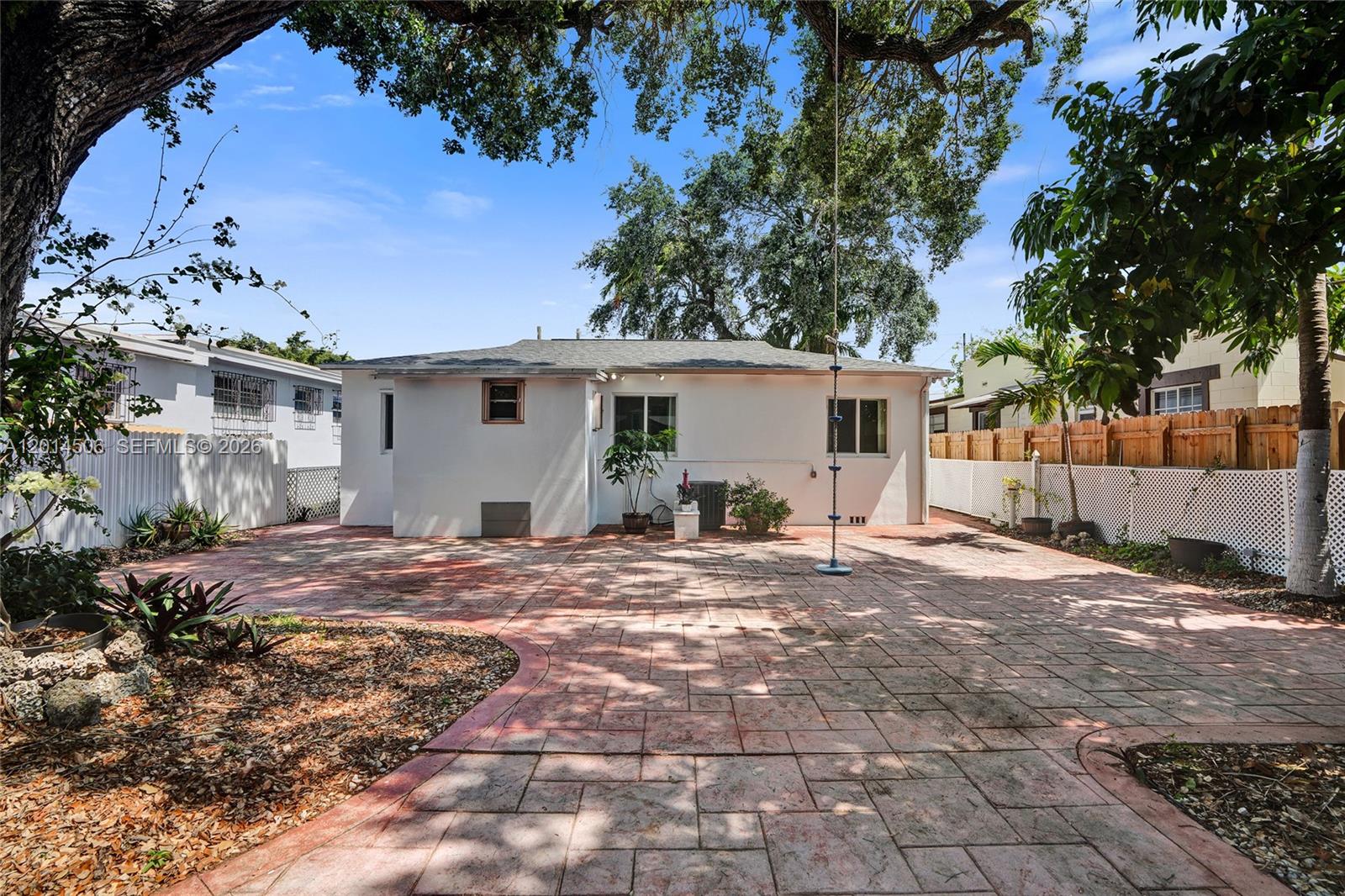 2420 Southwest 16th Street Miami, FL 33145 - Photo 31 of 35 a view of backyard of house with outdoor seating