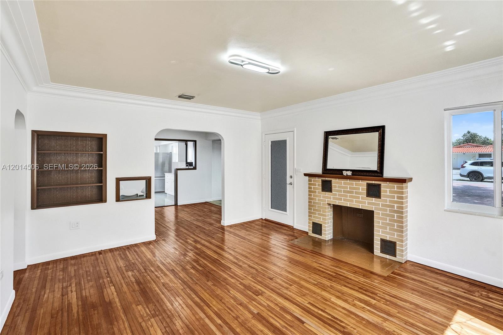 2420 Southwest 16th Street Miami, FL 33145 - Photo 5 of 35 a view of living room with furniture and flat screen tv