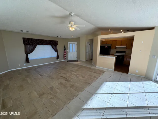 a view of a livingroom with a staircase