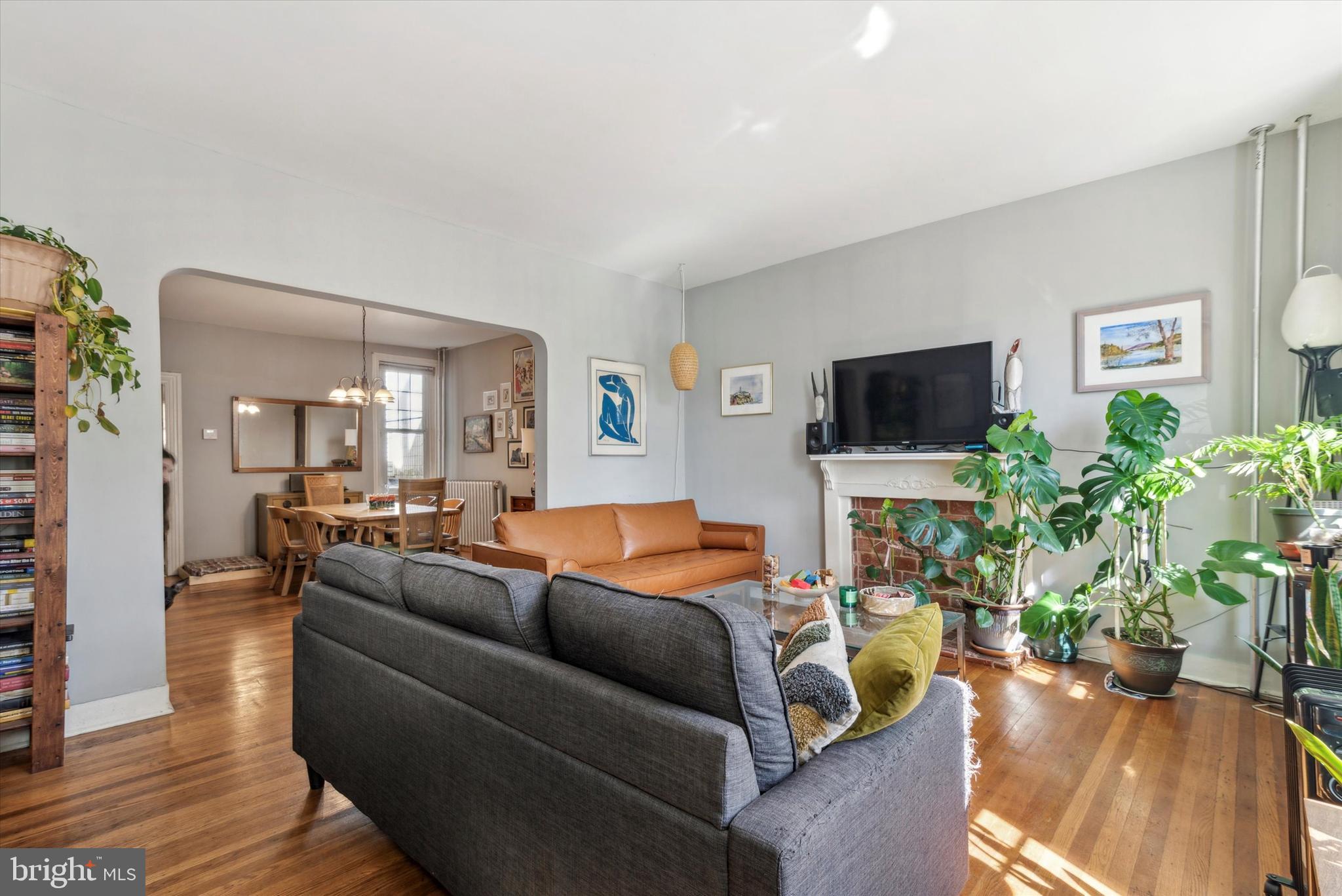 123 Kalos Street Philadelphia, PA 19128 - Photo 2 of 15 a living room with furniture and a flat screen tv