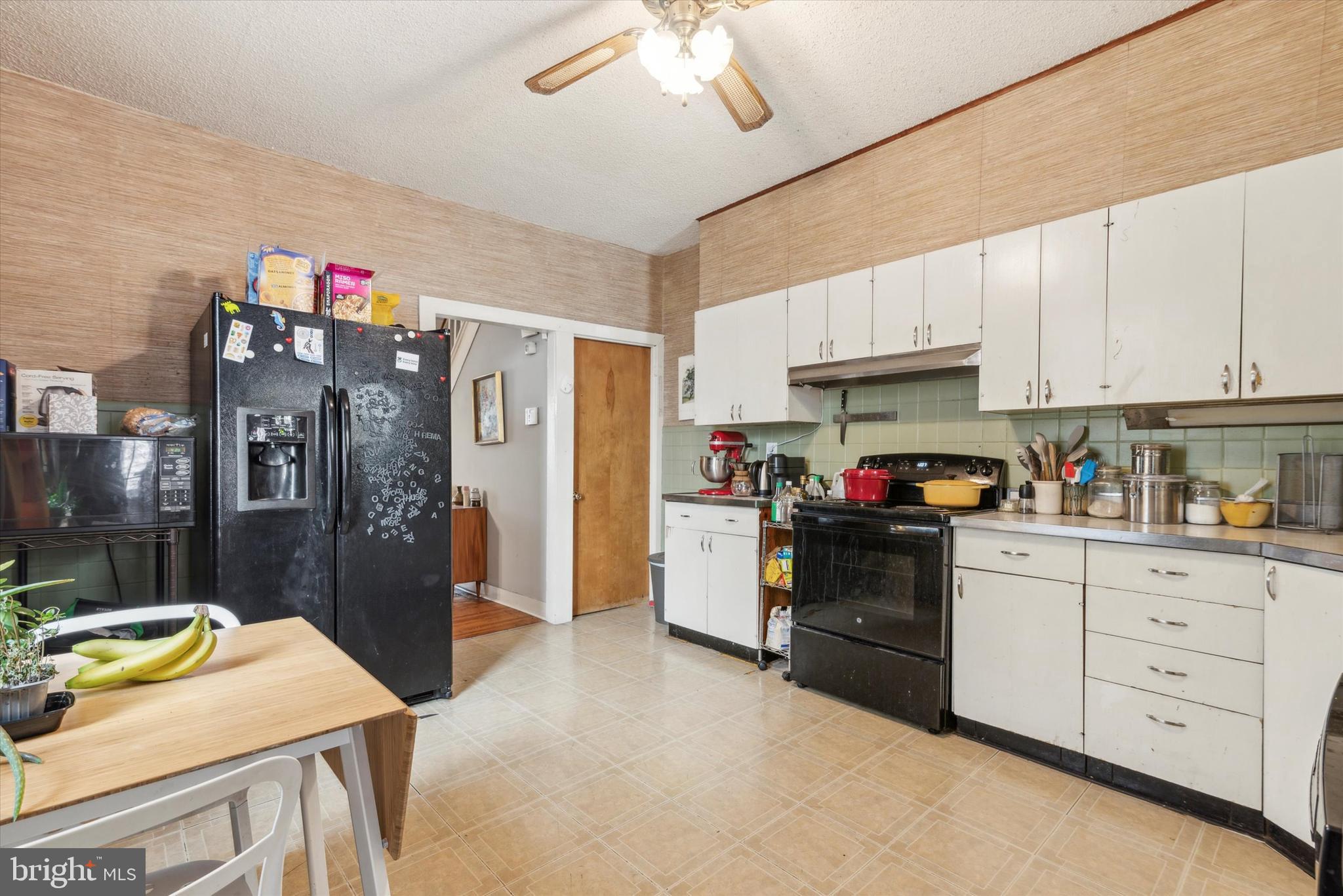 123 Kalos Street Philadelphia, PA 19128 - Photo 8 of 15 a kitchen with refrigerator and cabinets