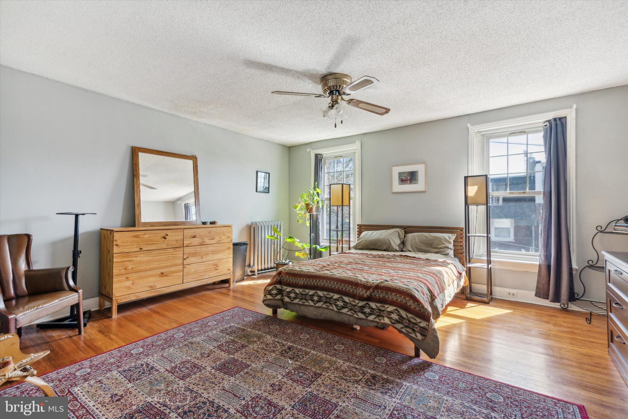 123 Kalos Street Philadelphia, PA 19128 - Photo 10 of 15 a bedroom with a bed and wooden floor