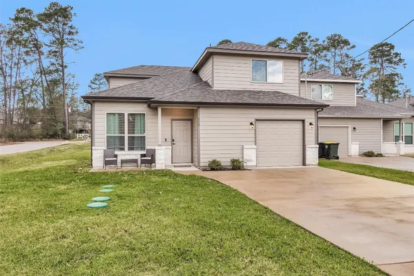 a house view with a garden space