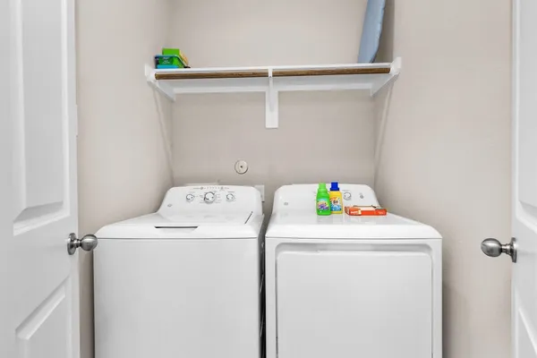 a utility room with dryer and washer