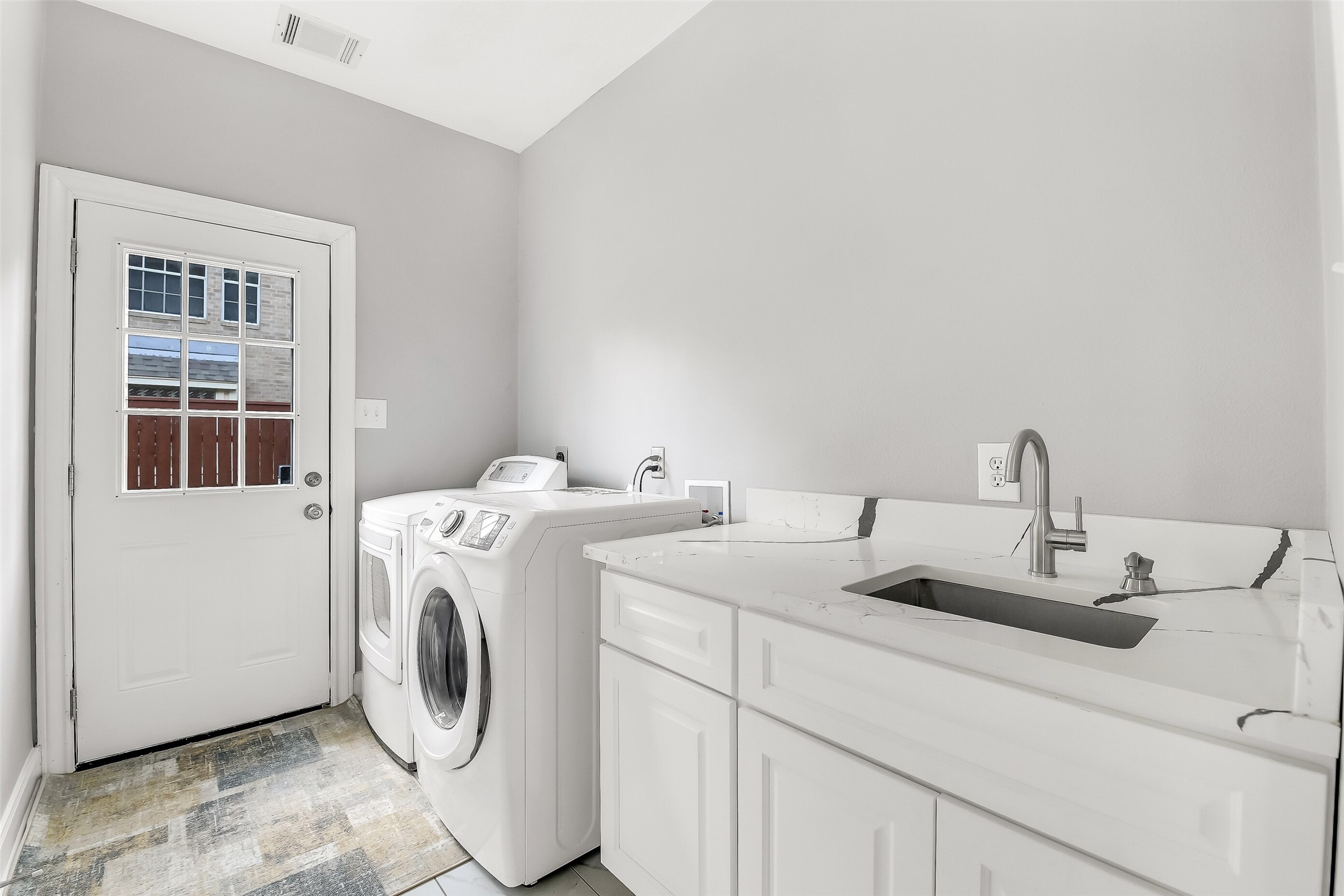18414 Bull Pine Drive Spring, TX 77379 - Photo 27 of 43 a utility room with dryer and washer