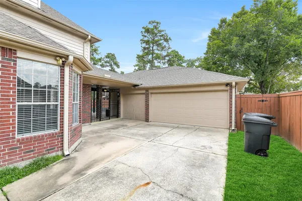 a front view of a house with garage