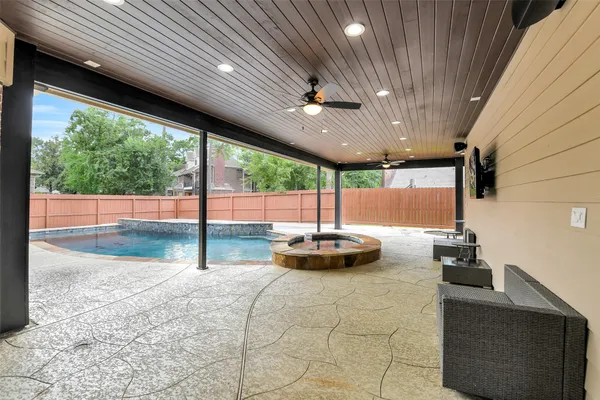 a room with gym equipment and a large window