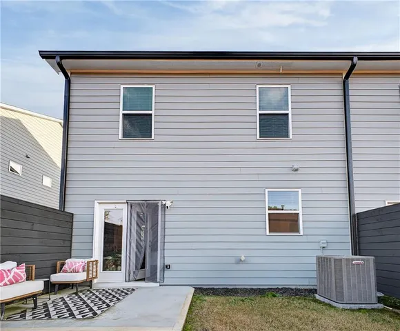 a view of house with a patio