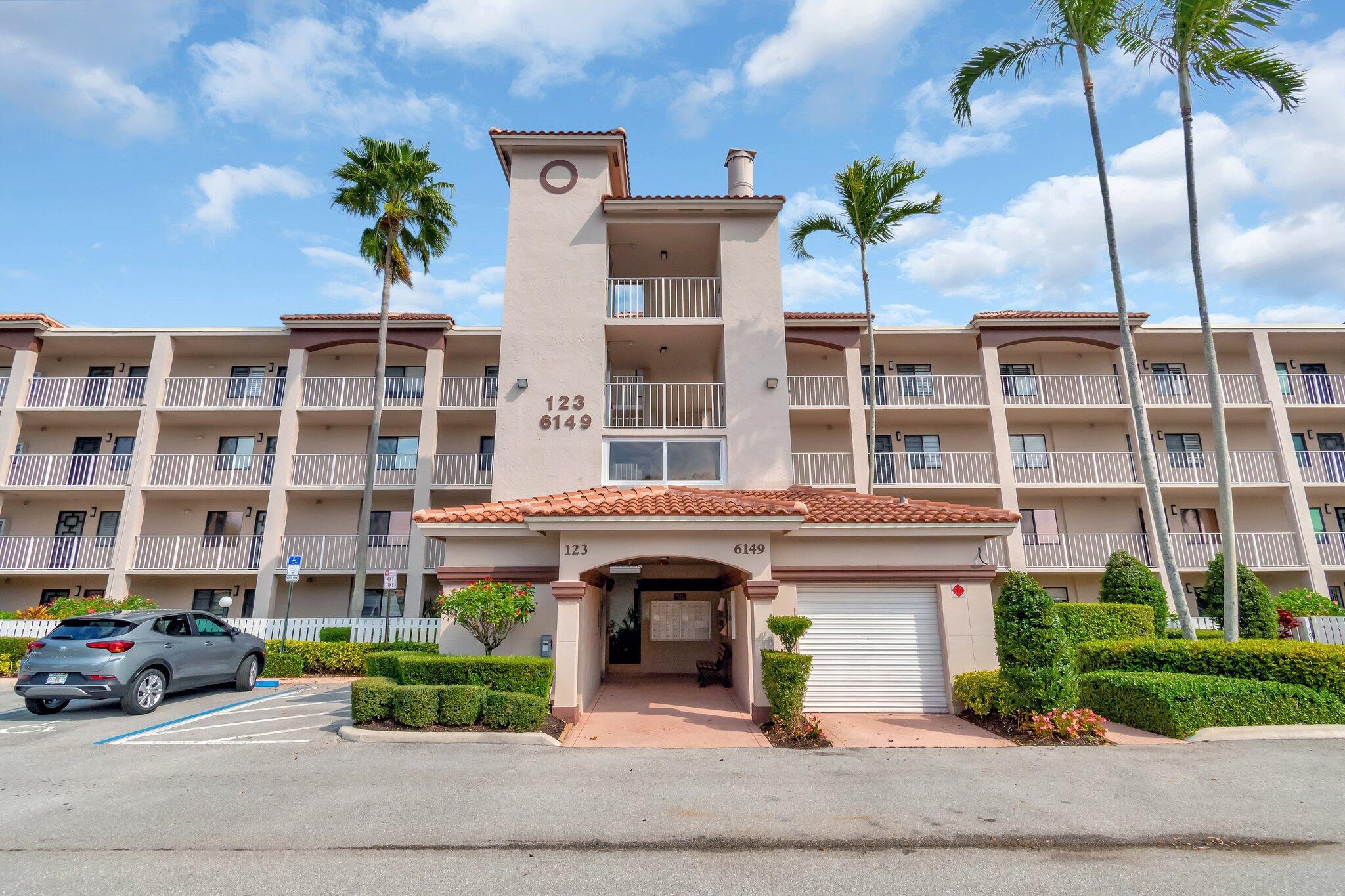 6149 Pointe Regal Circle, Unit 309 Delray Beach, FL 33484 - Photo 1 of 106 Front View of the Building