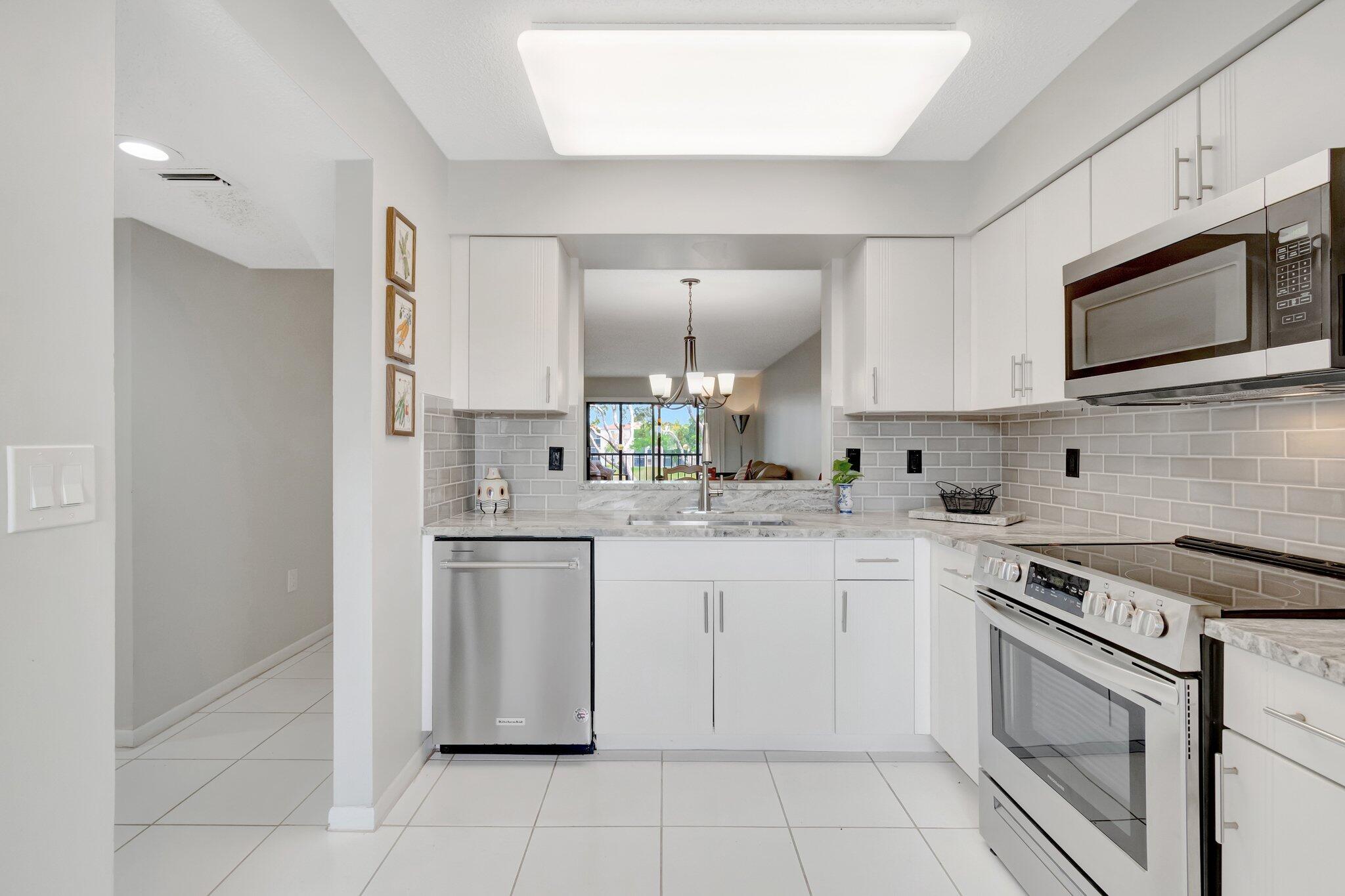 6149 Pointe Regal Circle, Unit 309 Delray Beach, FL 33484 - Photo 11 of 106 Kitchen