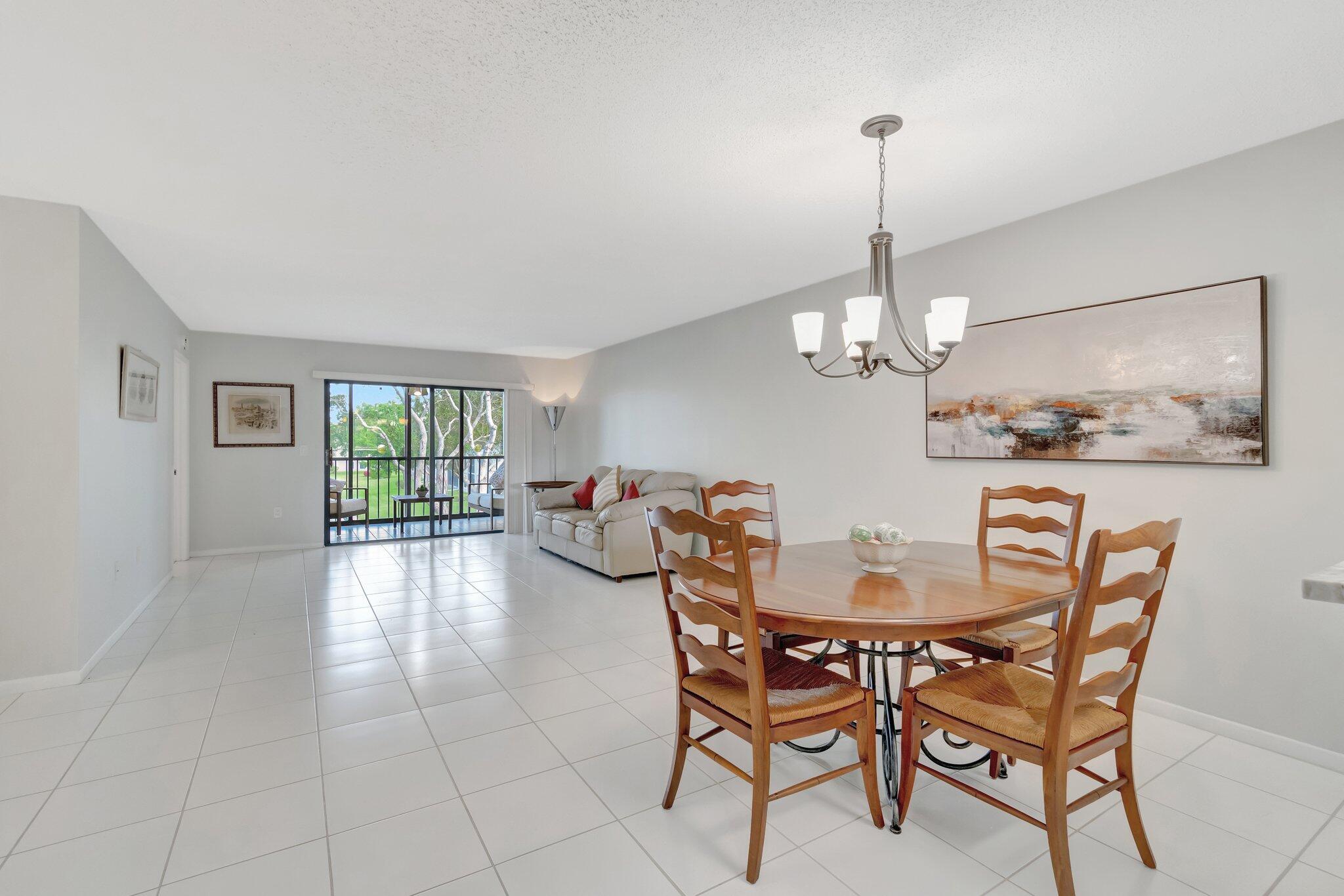 6149 Pointe Regal Circle, Unit 309 Delray Beach, FL 33484 - Photo 12 of 106 Dining / Living Area