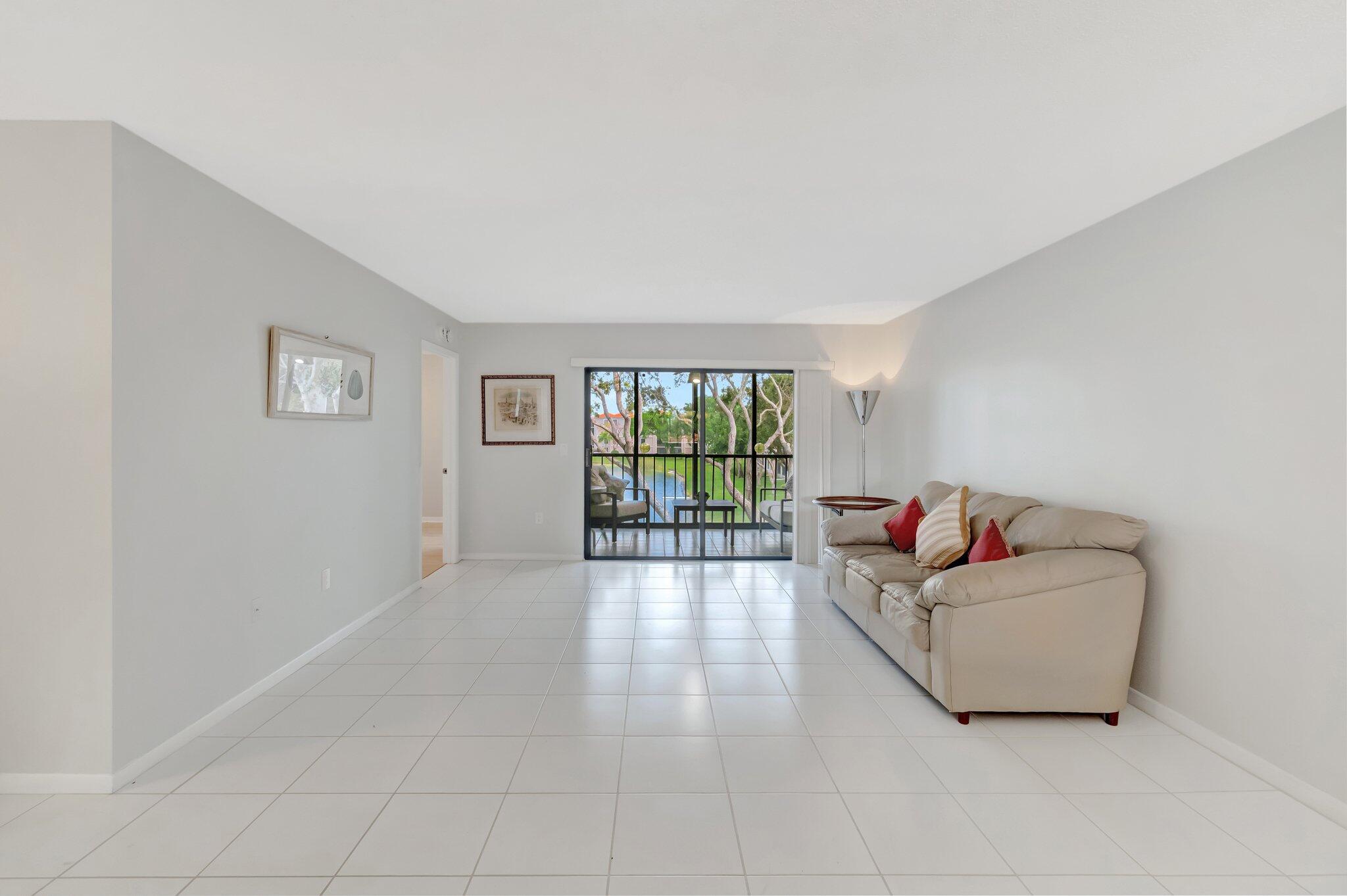 6149 Pointe Regal Circle, Unit 309 Delray Beach, FL 33484 - Photo 14 of 106 Living Room