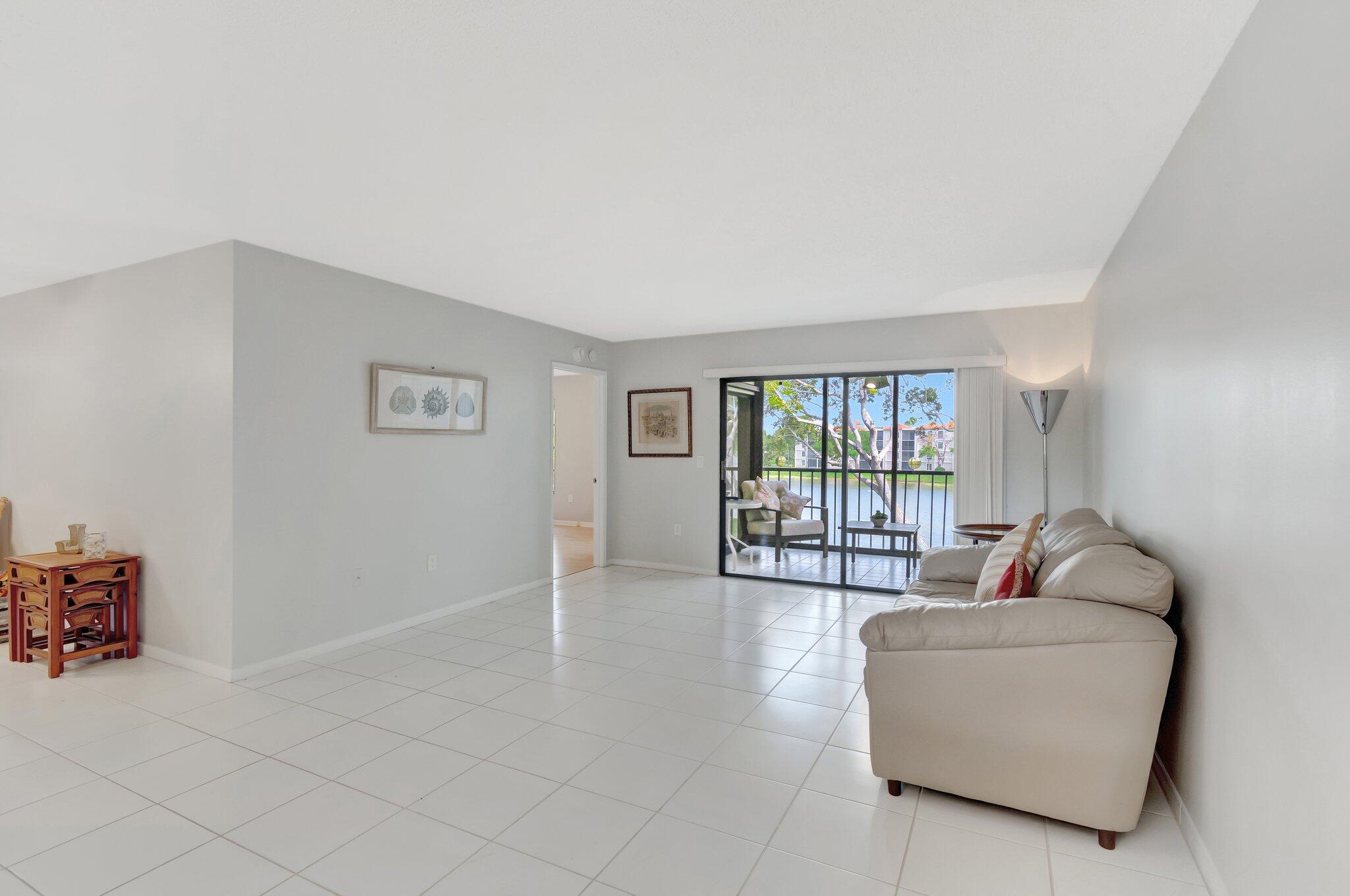 6149 Pointe Regal Circle, Unit 309 Delray Beach, FL 33484 - Photo 15 of 106 Living Room
