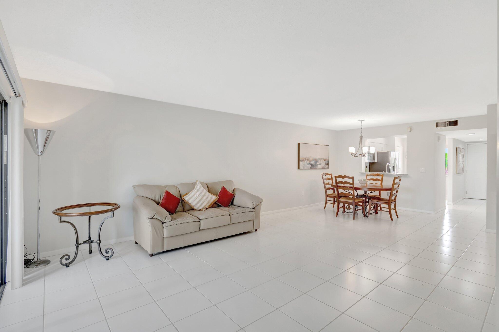 6149 Pointe Regal Circle, Unit 309 Delray Beach, FL 33484 - Photo 16 of 106 Living /Dining Room Area
