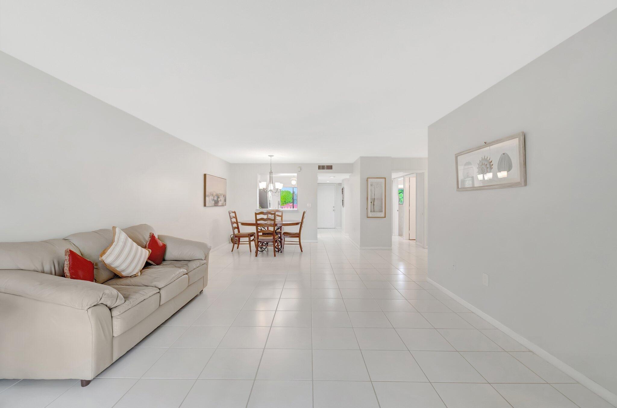 6149 Pointe Regal Circle, Unit 309 Delray Beach, FL 33484 - Photo 17 of 106 Living /Dining Room Area