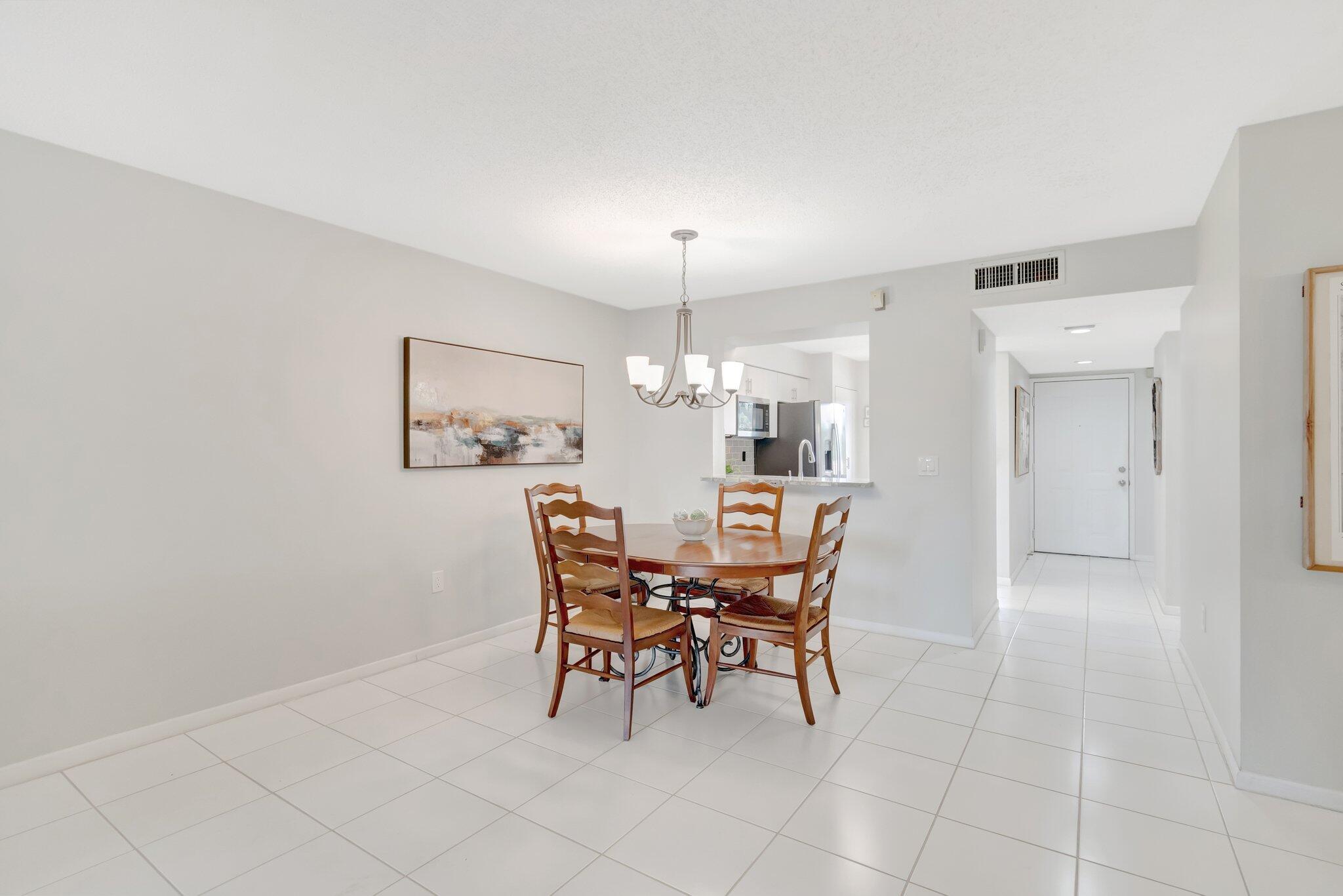 6149 Pointe Regal Circle, Unit 309 Delray Beach, FL 33484 - Photo 19 of 106 Dining Room Area
