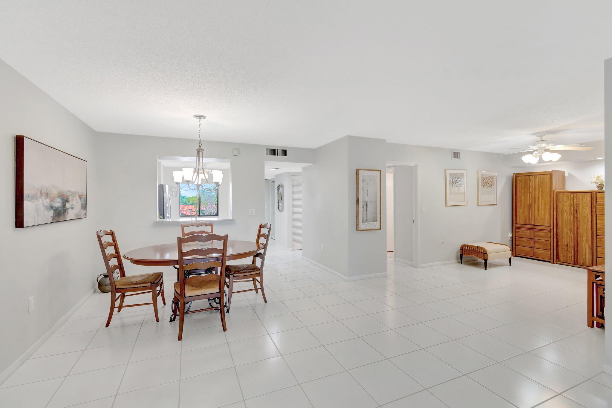 6149 Pointe Regal Circle, Unit 309 Delray Beach, FL 33484 - Photo 20 of 106 Living /Dining Room Area