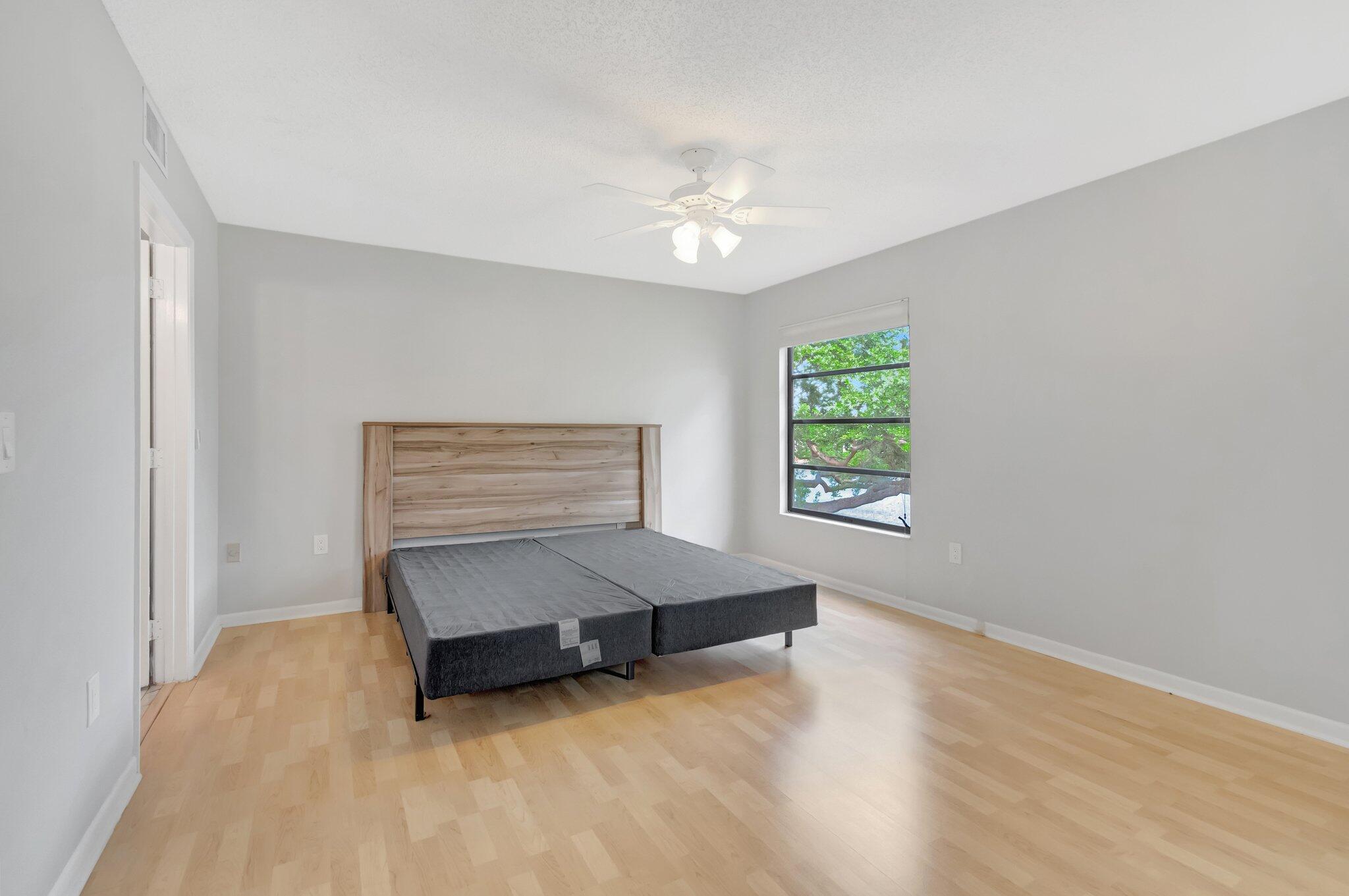 6149 Pointe Regal Circle, Unit 309 Delray Beach, FL 33484 - Photo 29 of 106 Spacious Primary Bedroom