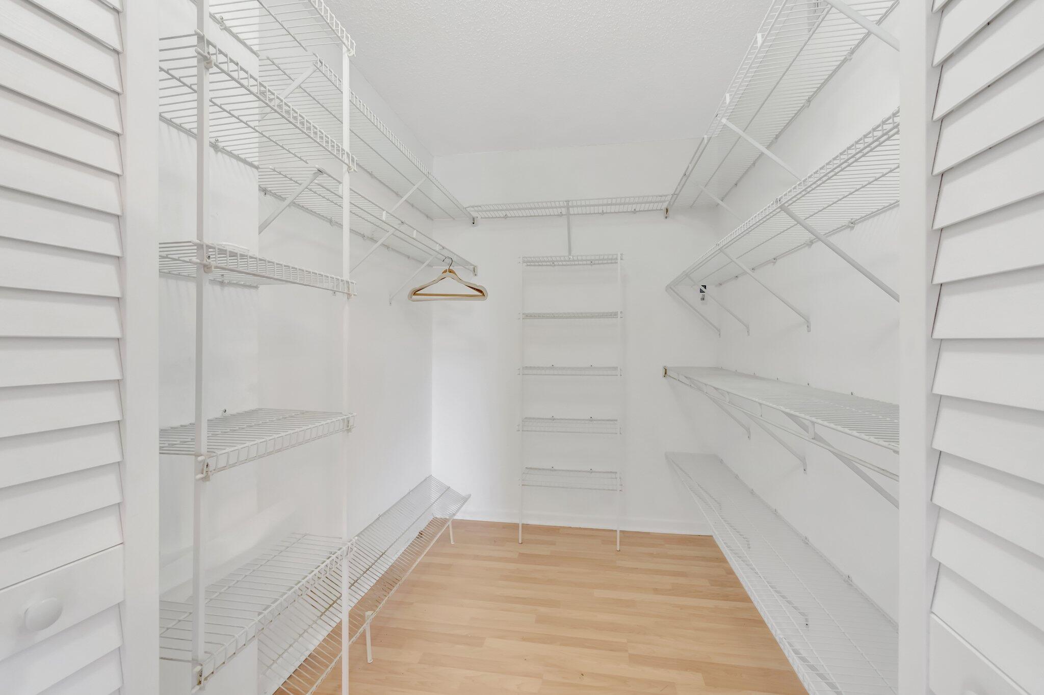 6149 Pointe Regal Circle, Unit 309 Delray Beach, FL 33484 - Photo 34 of 106 Primary Walk-In Closet